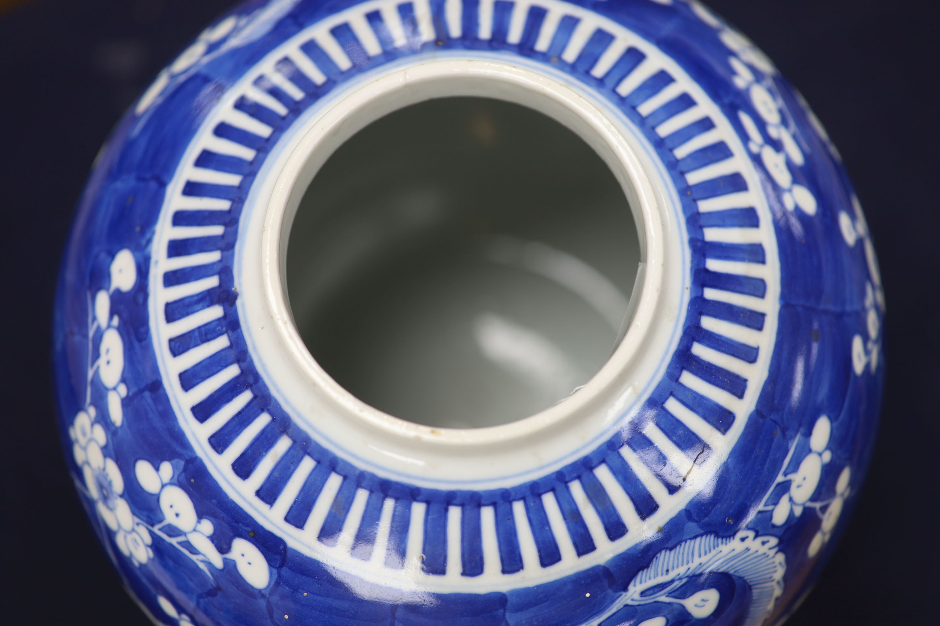 An early 20th century Chinese blue and white prunus jar and cover, height 26cm